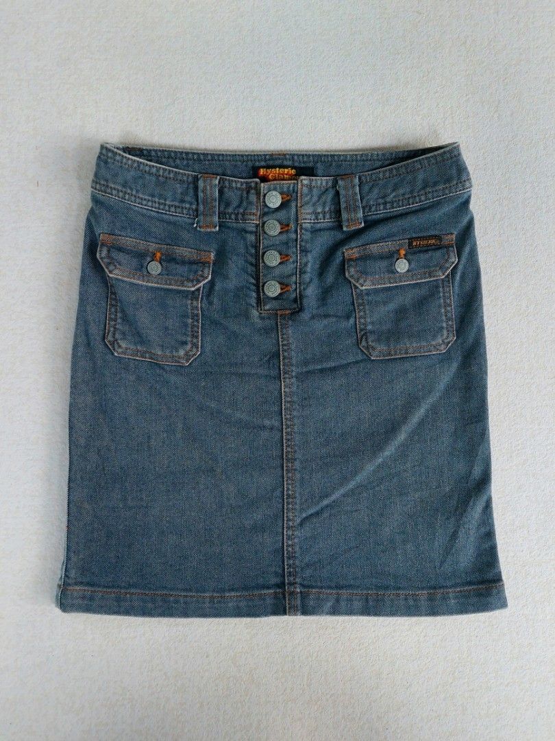 Hysteric Glamour Denim Button-Up Skirt (Category: Skirts) located in Palayan City. Submitted by akhai420 (Listing ID 1464199749, Image 1). Description: Waistline: 28-30 Lenght: 17.5 Condition: Excellent Flaws: minimal loose stitching on the back, check last photo.
