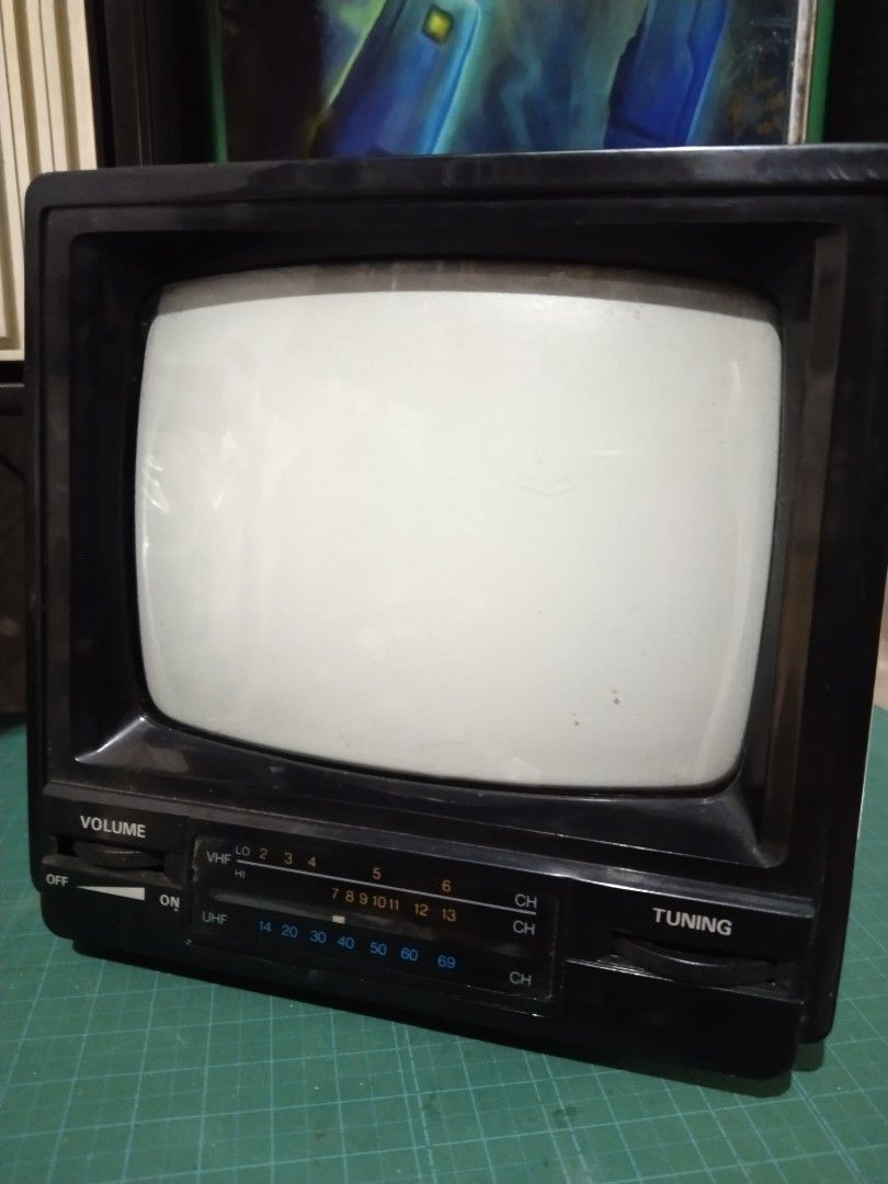 IMA Portable TV - Model 58W (Category: TV) located in Manila. Submitted by megazordbuilderhunter (Listing ID 1464139305, Image 3). Description: 6500 - Portable TV, Model 58W - Power Options: DC12V adapter - Channels: VHF and UHF - Includes antenna - Ideal for retro setups or as a spare TV - Tested: Powers on, shows static - Condition: Minor dust and scuffs from storage -manufactiring date August 1990.