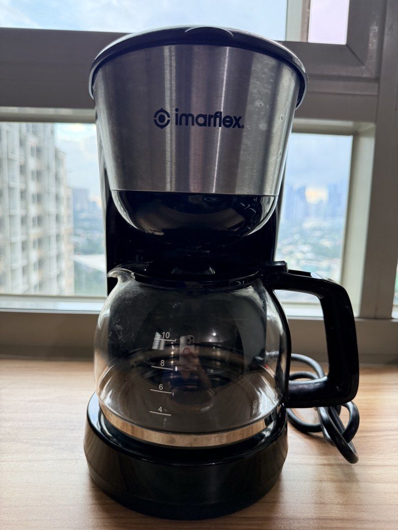 Imarflex Drip Coffee Maker with Glass Carafe (Category: Coffee Machines & Makers) located in Pasig City. Submitted by vdejesus (Listing ID 1464149150, Image 2). Description: ☕ Imarflex 10-Cup Drip Coffee Maker (Stainless Steel Finish) ✨ Condition & Details: Brand: Imarflex Condition: Preloved / Fully functional, clean, and well-maintained. Capacity: 10 Cups (Ideal for home, condo, or small office use)..
