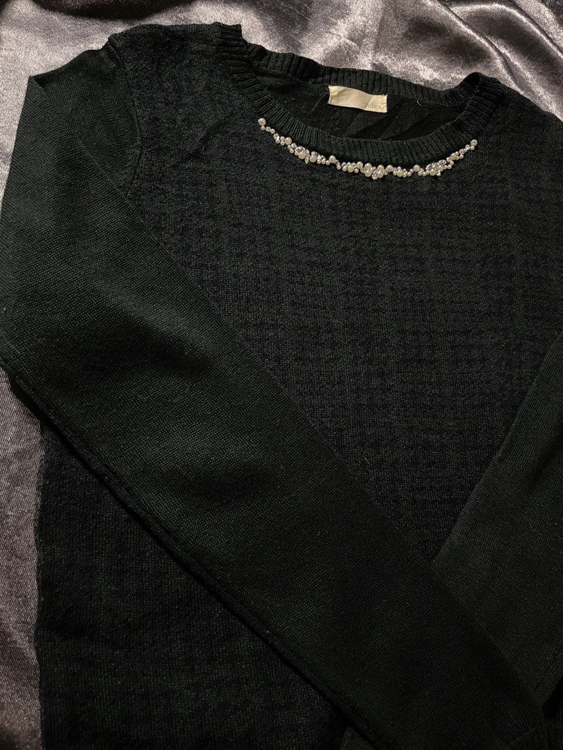 Index Black Embellished Crew Neck Sweater (Category: Coats, Jackets and Outerwear) located in Cavite. Submitted by bellewii (Listing ID 1464289952, Image 3). Description: - Brand: Index - Color: Black - Style: Long-sleeved sweater - Neckline: Crew neck with beaded and jeweled detail - Knit: Subtle textured pattern - Versatility: Perfect for dressing up or down.