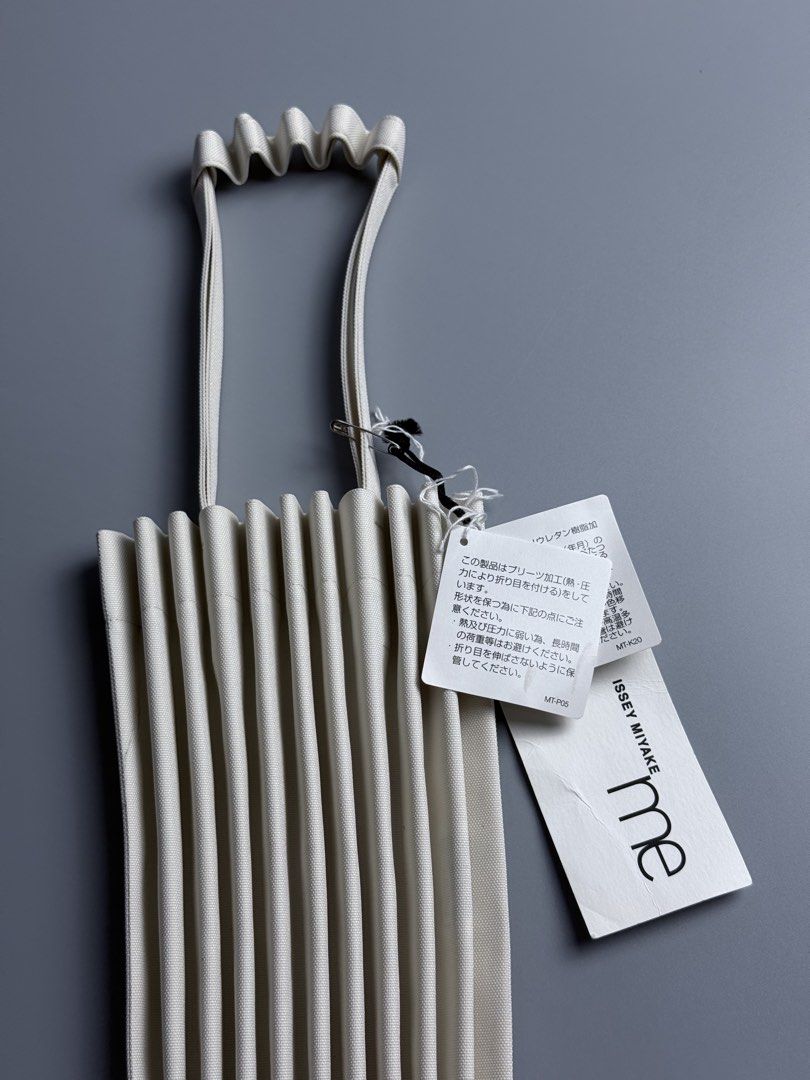 Issey Miyake Trunks Pleats Bag (Category: Tote Bags) located in San Pablo. Submitted by zzz.archvs (Listing ID 1464255508, Image 3). Description: New with Hang tags Dimensions: Handle Length - 43cm Height - 28cm Width - 28 cm.