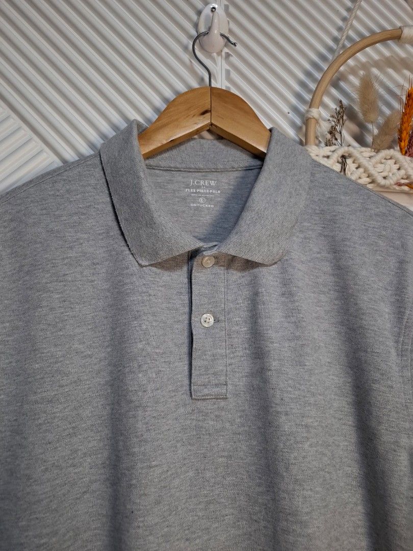J. Crew Grey Polo Shirt (Category: Tshirts & Polo Shirts ) located in Bulacan. Submitted by cathycampo51092 (Listing ID 1464266593, Image 1). Description: - Grey J. Crew Polo Shirt - Fits Medium to Large (M-L) - Chest Width: 22 inches - Length: 26 inches - Very comfortable and classic style - Ideal for casual outings or smart-casual looks.