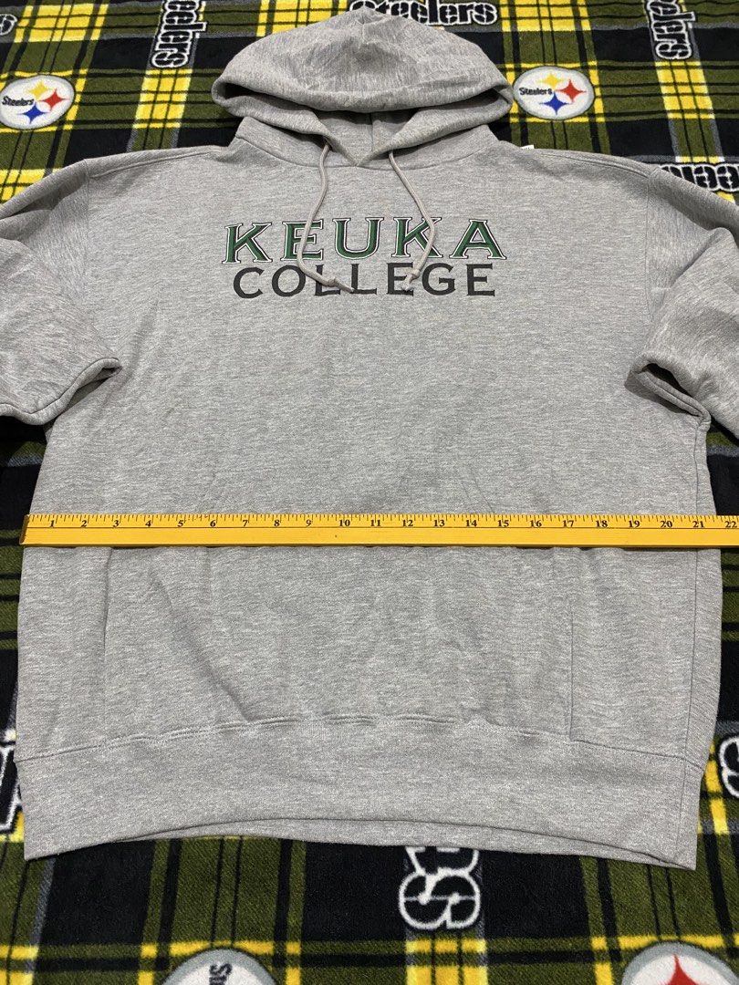 JANSPORT, jacket (Category: Coats, Jackets and Outerwear) located in Cavite. Submitted by jc_thrift95 (Listing ID 1464141459, Image 3). Description: - This classic gray pullover hoodie features distinct green collegiate “Keuka College” lettering printed across the chest. - Made in Lesotho - Color rate 8/10 - See pictures details for dimes..