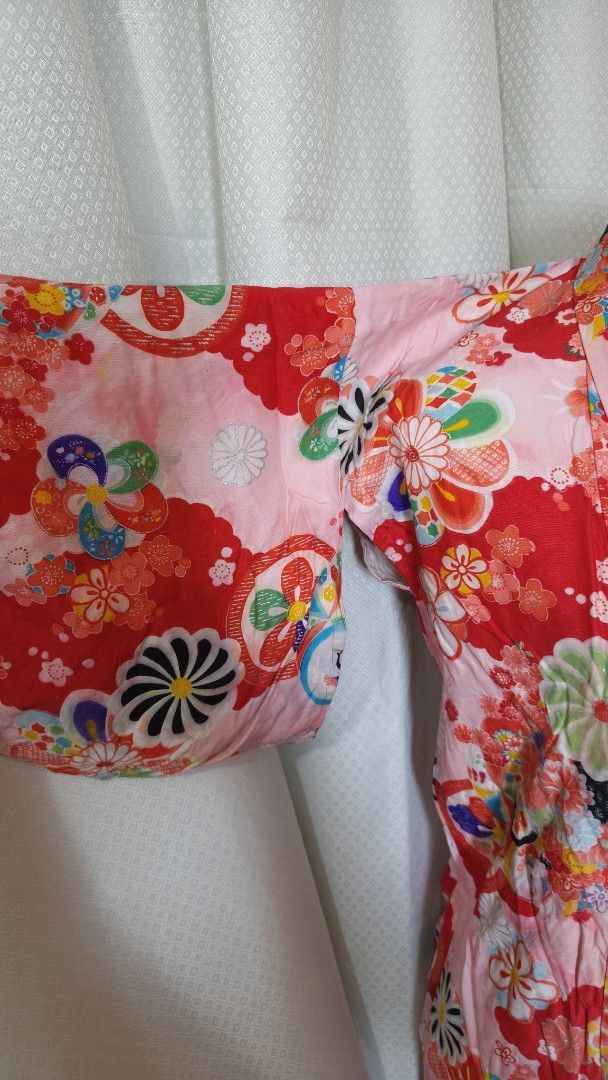 Japanese Floral Kimono Jacket Robe (Category: Coats, Jackets and Outerwear) located in Taguig. Submitted by ymicloset (Listing ID 1464213643, Image 2). Description: - Beautiful traditional Japanese kimono jacket - Vibrant red and pink floral print with intricate patterns - Short sleeves - Open front with tie closure - Great for layering or as a statement piece - Perfect for cultural events or adding unique flair -Waist 32 in -Shoulder 16 in -Slee