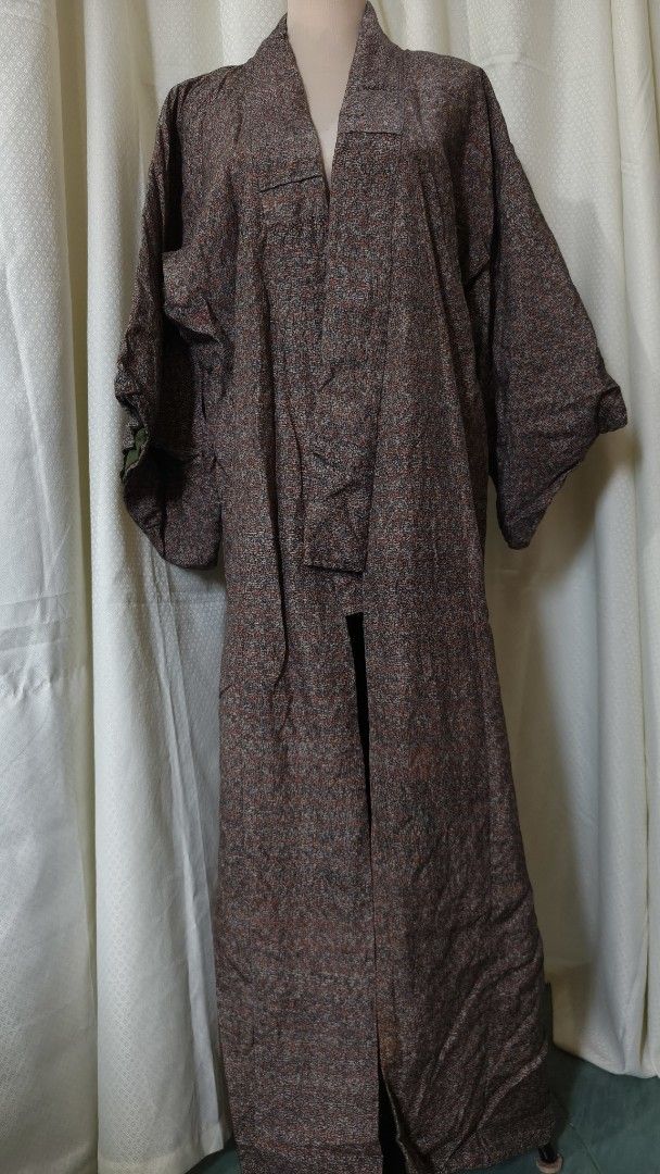 Japanese Style Kimono Jacket - Textured Pattern (Category: Coats, Jackets and Outerwear) located in Taguig. Submitted by ymicloset (Listing ID 1464222746, Image 1). Description: - Long kimono-style jacket - Textured all-over pattern (brown, grey, pinkish tones) - Open front design - Wide sleeves - Lined interior with contrasting green bottom panel - Ideal for unique layering -Waist 46 in -Shoulder 24 1/2 in -Sleeve 15 in -Length 55 in Pls. manage