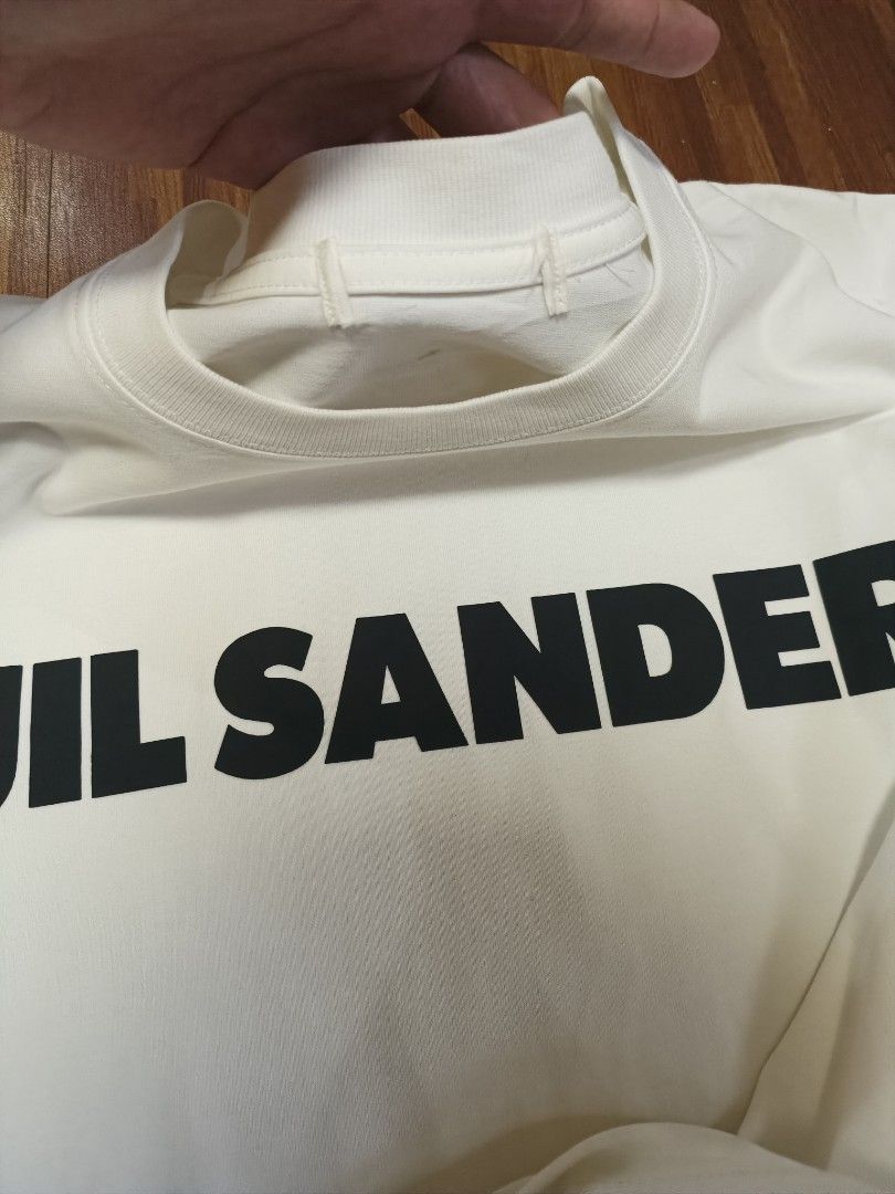Jil Sander (Category: Tshirts & Polo Shirts ) located in Cavite. Submitted by south.loot (Listing ID 1464188746, Image 2). Description: Jil Sander Tee Size M-L Length 26.5 Width 21 Excellent condition Cut size and wash tag.