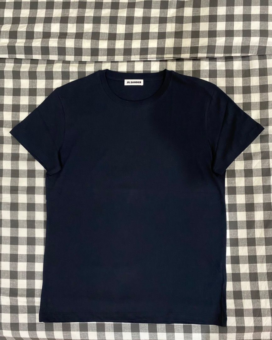 Jil Sander navy blue Tee shirt (tshirt) (Category: Tshirts & Polo Shirts ) located in Paranaque City. Submitted by zebjeugenio (Listing ID 1464304224, Image 1). Description: For sale is a never used Jil Sander Navy blue tee (tshirt) Length: 71cm Width: 51.5 100% cotton Made in Greece .