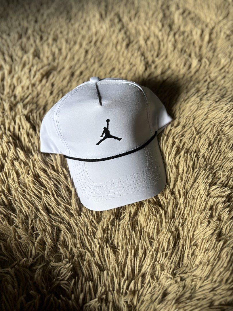 Jordan Rise Cap White ML (Category: Caps & Hats) located in Quezon City. Submitted by nojthrift (Listing ID 1464250693, Image 1). Description: - Classic white Jordan cap - Features the iconic Jumpman logo on the front - Adjustable strap at the back for a customized fit - Size ML - Ideal for everyday wear and sports activities 700+ship.