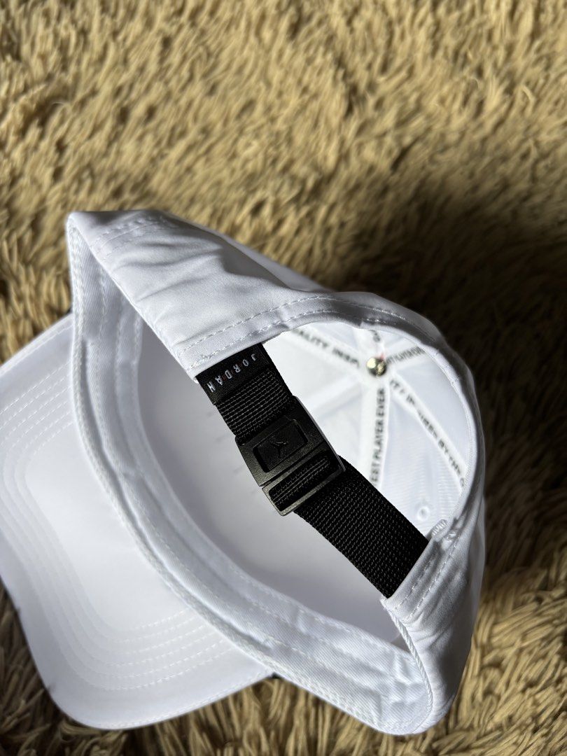 Jordan Rise Cap White ML (Category: Caps & Hats) located in Quezon City. Submitted by nojthrift (Listing ID 1464250693, Image 3). Description: - Classic white Jordan cap - Features the iconic Jumpman logo on the front - Adjustable strap at the back for a customized fit - Size ML - Ideal for everyday wear and sports activities 700+ship.