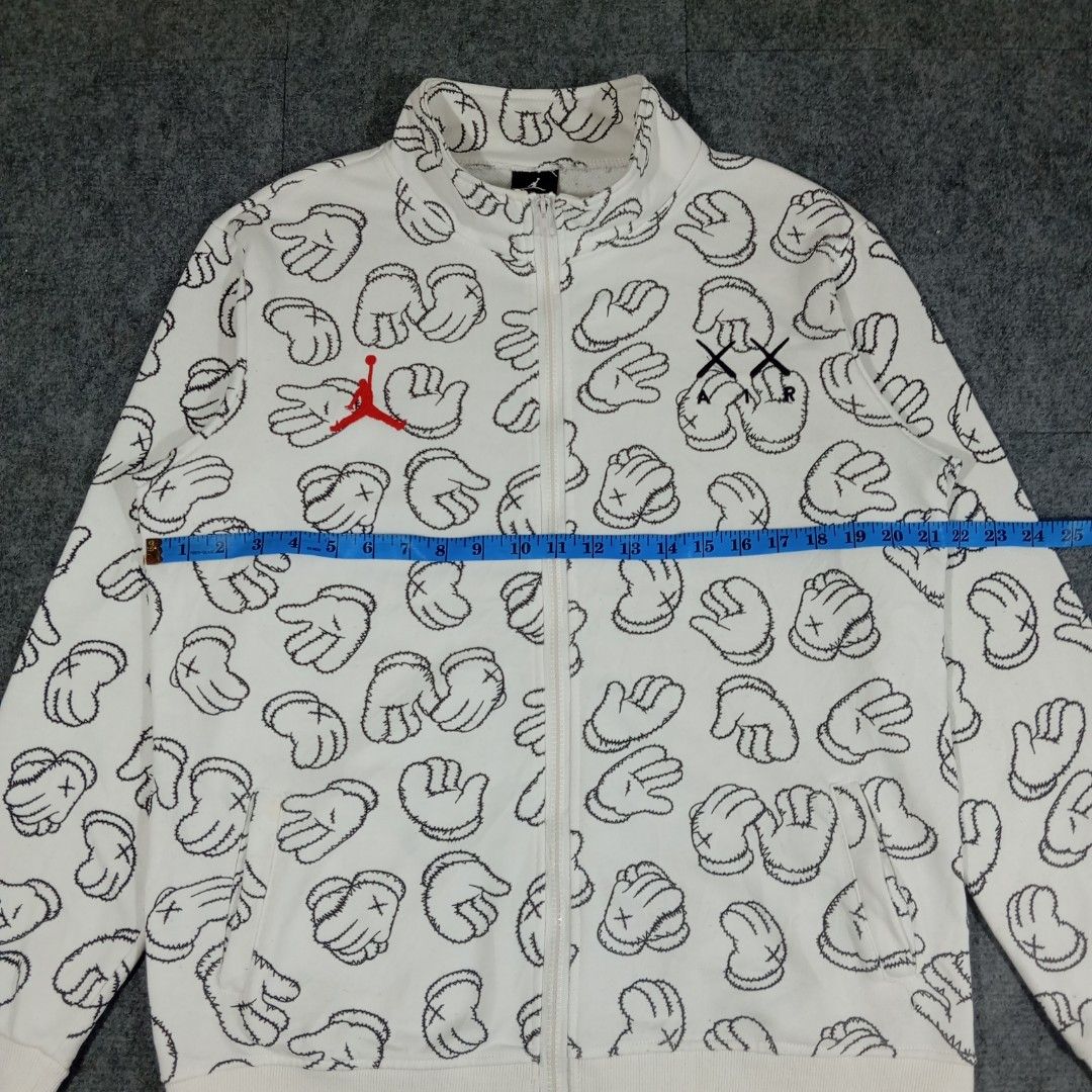 Jordan x Kaws AOP Fullzip Jacket (Category: Coats, Jackets and Outerwear) located in Taguig. Submitted by sito. (Listing ID 1464299229, Image 3). Description: For sale! 📣 Jordan x Kaws AOP Fullzip Jacket Specs and measurements: • Size Medium • Length 26.5 inches • Width 21.5 inches Condition Details: • Issue: Washable Stain • Color rate: 10/10 • Overall Condition: 10/10 Asking Price: ~₱690 (NEGO) Transaction Details: Location: Upper Bicutan, Tag