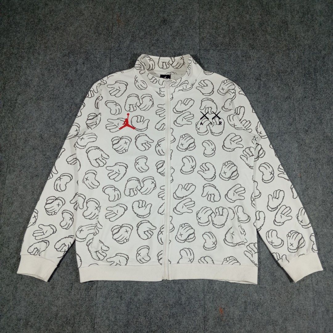 Jordan x Kaws AOP Fullzip Jacket (Category: Coats, Jackets and Outerwear) located in Taguig. Submitted by sito. (Listing ID 1464299229, Image 1). Description: For sale! 📣 Jordan x Kaws AOP Fullzip Jacket Specs and measurements: • Size Medium • Length 26.5 inches • Width 21.5 inches Condition Details: • Issue: Washable Stain • Color rate: 10/10 • Overall Condition: 10/10 Asking Price: ~₱690 (NEGO) Transaction Details: Location: Upper Bicutan, Tag