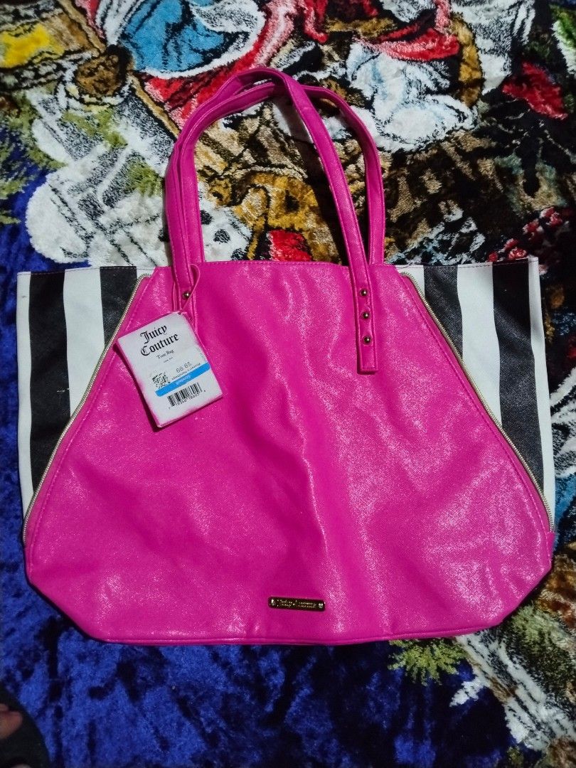 Juicy Couture Tote Bag (Category: Tote Bags) located in Mabalacat. Submitted by al_amin_thrift (Listing ID 1464232094, Image 1). Description: 💖 Juicy Couture Tote Bag — Bright Pink & Striped Item Details - Brand: Juicy Couture — iconic luxury lifestyle brand ​ - Style: Large expandable tote bag ​ - Design: Vibrant bright pink main body with black-and-white striped side panels; gold-tone hardware & zippers ​ - Material: Smooth textured faux leath