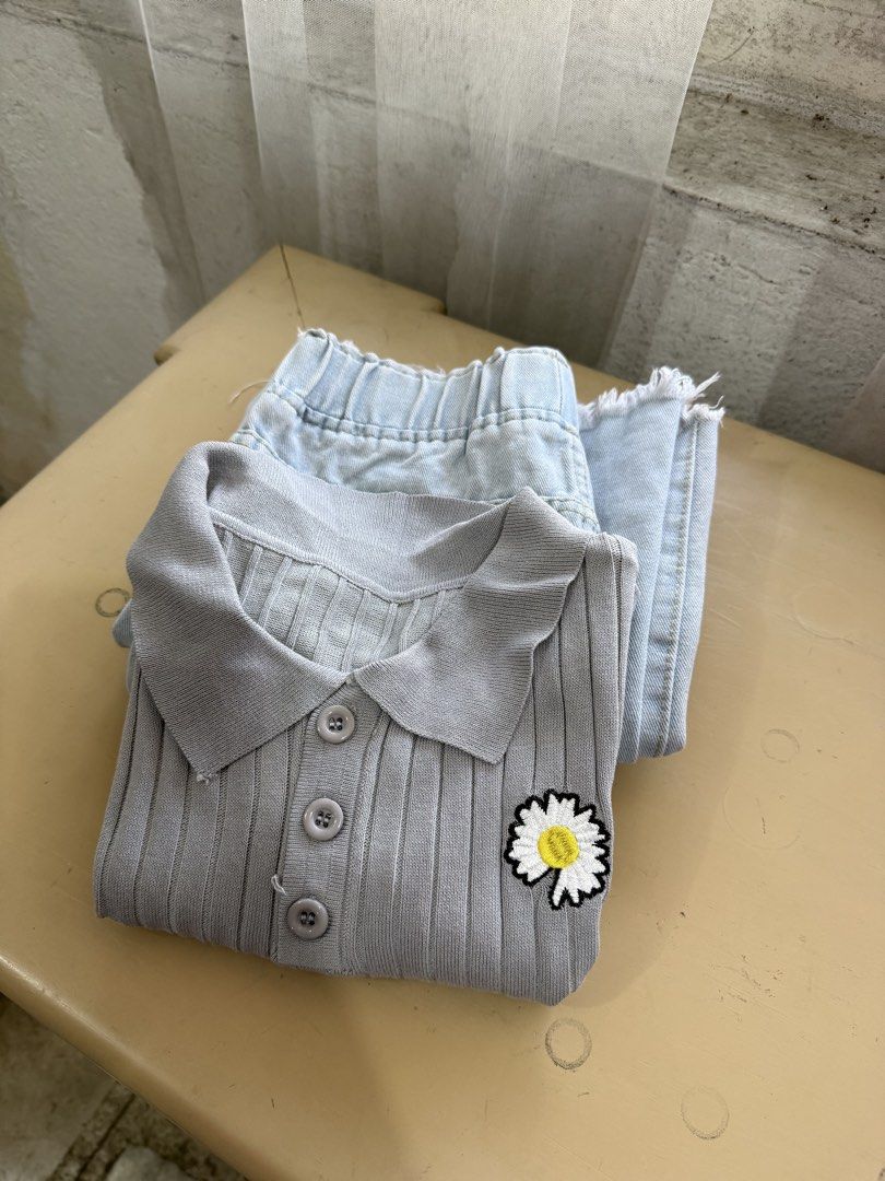 JUST G Light Wash Jeans & Cute Tops Set (Category: Sets or Coordinates) located in Cabuyao City. Submitted by arral (Listing ID 1464239673, Image 3). Description: - JUST G light wash wide-leg jeans - Elastic waistband with button details - Frayed hem - Grey ribbed polo top with daisy patch - Pink eyelet knit cardigan - Sold as a complete casual outfit set.