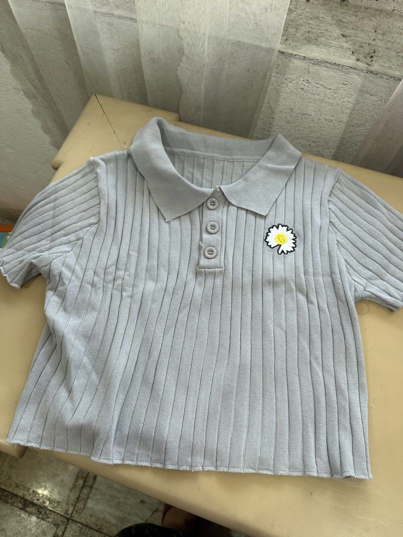 JUST G Light Wash Jeans & Cute Tops Set (Category: Sets or Coordinates) located in Cabuyao City. Submitted by arral (Listing ID 1464239673, Image 2). Description: - JUST G light wash wide-leg jeans - Elastic waistband with button details - Frayed hem - Grey ribbed polo top with daisy patch - Pink eyelet knit cardigan - Sold as a complete casual outfit set.