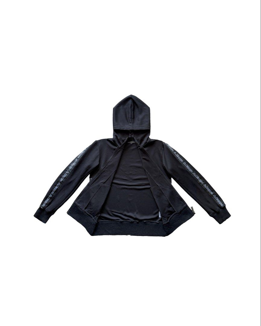 Kappa Hooded Jacket (Category: Coats, Jackets and Outerwear) located in Manila. Submitted by morf_sply (Listing ID 1464300728, Image 3). Description: Lightweight jacket made of cotton fabric. Hoddie with front chest logo design and hip pockets. Long sleeves with ribbed cuffs printed with brand name. Ribbed trims. Zip-up front. Shoulder Width 17 in Pit to Pit 20 in Length 24 in Sleeves 24 in.