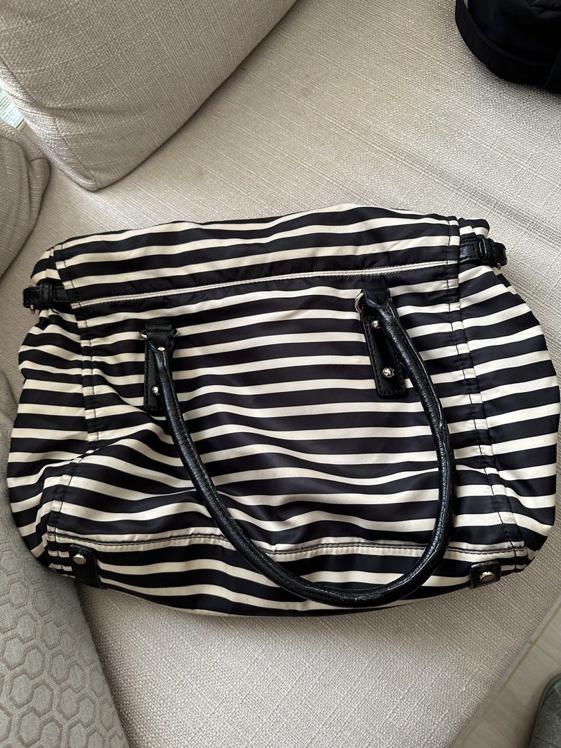 Bags Bundle: Kate Spade Black & White Striped Tote Bag & BASH (Category: Tote Bags) located in Manila. Submitted by qualitypreluvd (Listing ID 1464157272, Image 2). Description: - Kate Spade Stripe Classic black and white striped tote bag - Brand: Kate Spade - Features black leather handles and trim - Bright red fabric interior lining - Ample space for essentials - Ideal for everyday use or travel - needs cleaning, no rips and tears Kate Spade Bl