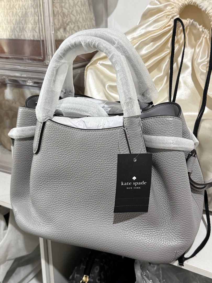 Kate Spade Dumpling Brand New in gray (Category: Shoulder Bags) located in San Fernando. Submitted by lei_sheena (Listing ID 1464196333, Image 2). Description: Brand New Authentic With Dust Bag With Tag .