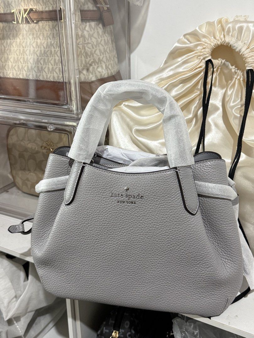 Kate Spade Dumpling Brand New in gray (Category: Shoulder Bags) located in San Fernando. Submitted by lei_sheena (Listing ID 1464196333, Image 1). Description: Brand New Authentic With Dust Bag With Tag .