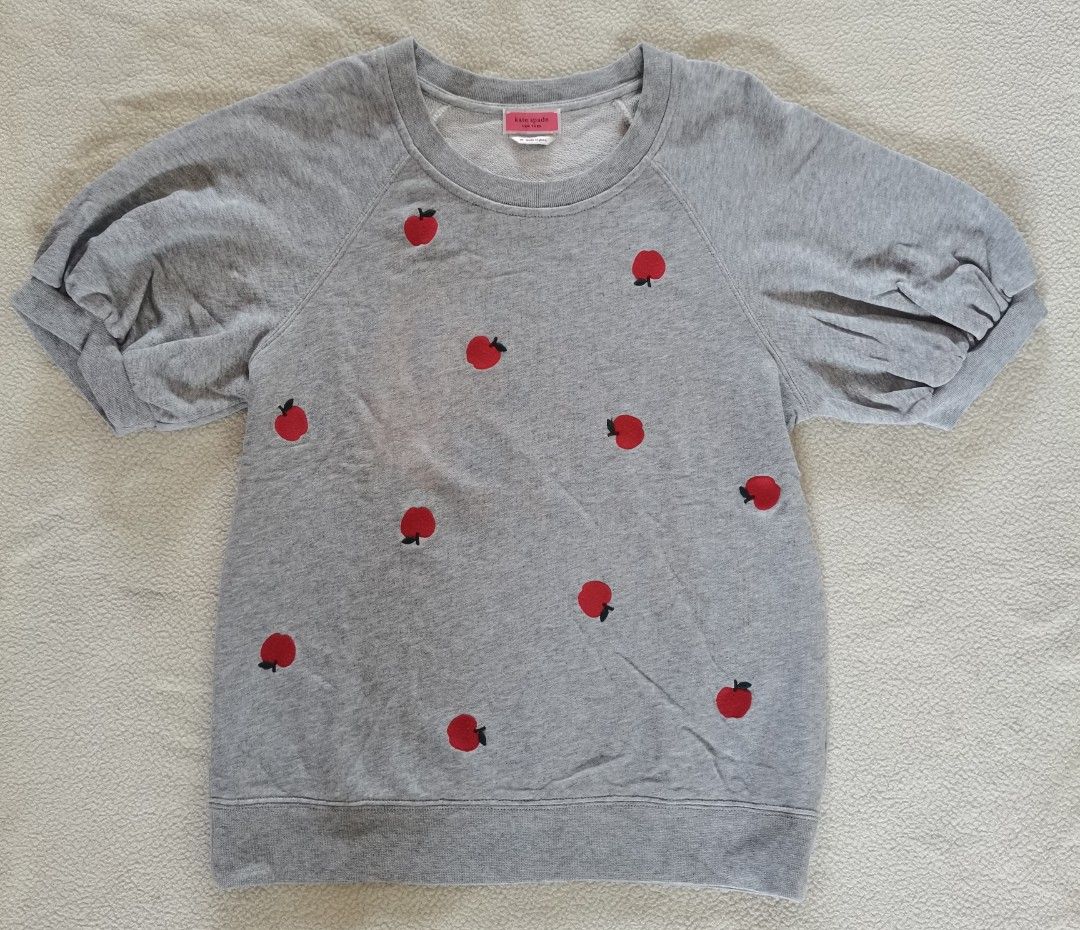 Kate Spade New York Apple Embroidered Pullover (Category: Blouses) located in Santa Cruz. Submitted by oddpenguin-4575 (Listing ID 1464277733, Image 2). Description: 📌.....P L E A S E R E A D..... 📌measurement:Laid flat Sh-25"/Sleeve-__/Chest-20.5"/Lenght-23"/armhole-6.5"/armpit-6.5" 📌size: women's Medium to Large (M - L) in standard casual wear or t-shirt sizing. 📌color-10/10 📌Brand:Picone Club 📌authentic Kate Spade New York Apple Embroide