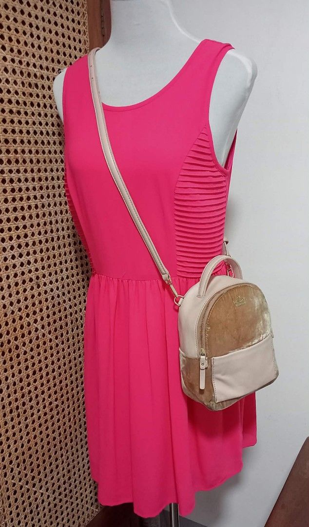 Kate Spade New York Velvet Mini Backpack (Category: Backpacks) located in Siniloan. Submitted by treyyasonlineshop (Listing ID 1464259327, Image 2). Description: - Cute mini backpack from Kate Spade - Tan velvet and light pink leather combination - Features a front pocket - Adjustable straps for comfort - Minor wear on leather pocket and small scuff on the side - Plenty of life left, great for everyday use Mini size Backpack/sling bag Leather/vel