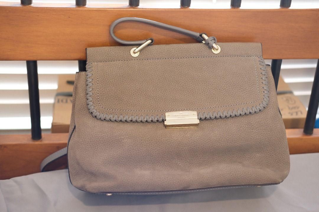 Kate Spade Suede Top Handle Bag (Category: Shoulder Bags) located in Makati City. Submitted by thunderhippo (Listing ID 1464218864, Image 3). Description: Never used, but bent out of shape in storage Comes with dust bag .