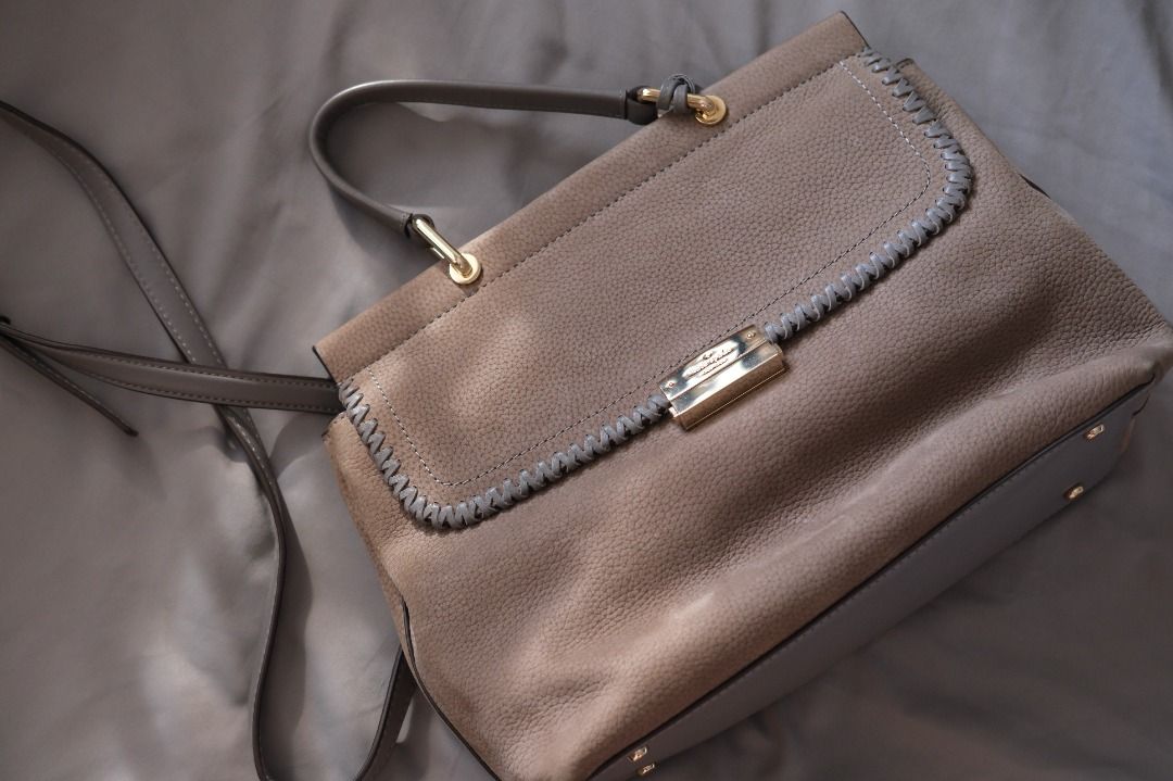 Kate Spade Suede Top Handle Bag (Category: Shoulder Bags) located in Makati City. Submitted by thunderhippo (Listing ID 1464218864, Image 1). Description: Never used, but bent out of shape in storage Comes with dust bag .