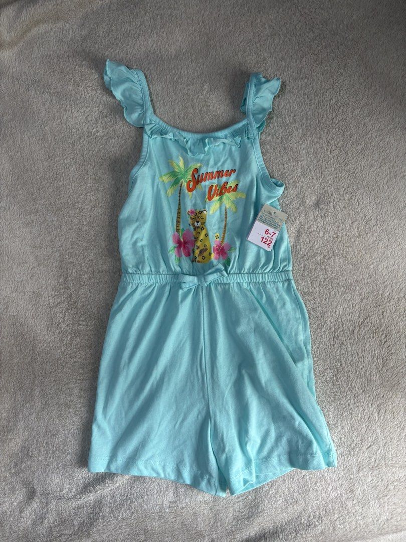 Kids' Summer Vibes Romper (Category: Babies & Kids Fashion) located in Mandaluyong City. Submitted by trissells (Listing ID 1464184999, Image 1). Description: - Cute light blue romper - Fun summer graphic: palm trees, leopard, flowers - Ruffle sleeves - Tie waist - Perfect for warm weather - Size: 6-7 years.