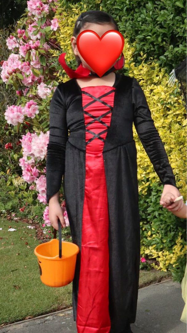 Kids Vampire Costume Dress (Category: Babies & Kids Fashion) located in Lubao. Submitted by shiesell (Listing ID 1464277779, Image 3). Description: - Kids vampire costume, ideal for Halloween or dress-up. - Features a long black dress with a red underskirt and lace-up detail. - Great for parties and trick-or-treating adventures..