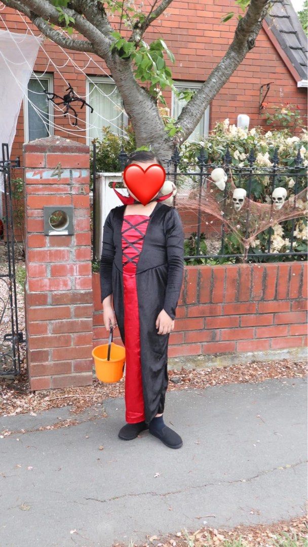 Kids Vampire Costume Dress (Category: Babies & Kids Fashion) located in Lubao. Submitted by shiesell (Listing ID 1464277779, Image 1). Description: - Kids vampire costume, ideal for Halloween or dress-up. - Features a long black dress with a red underskirt and lace-up detail. - Great for parties and trick-or-treating adventures..
