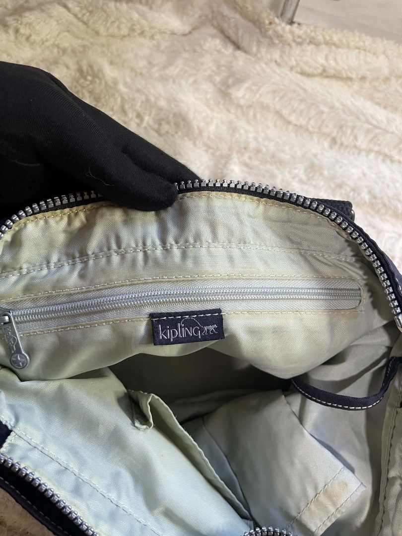 Kipling blue shoulder bag Original (Category: Shoulder Bags) located in Naawan. Submitted by twillycalledprelovedbags (Listing ID 1464171658, Image 3). Description: issue may dirt sa loob, and missing monkey.
