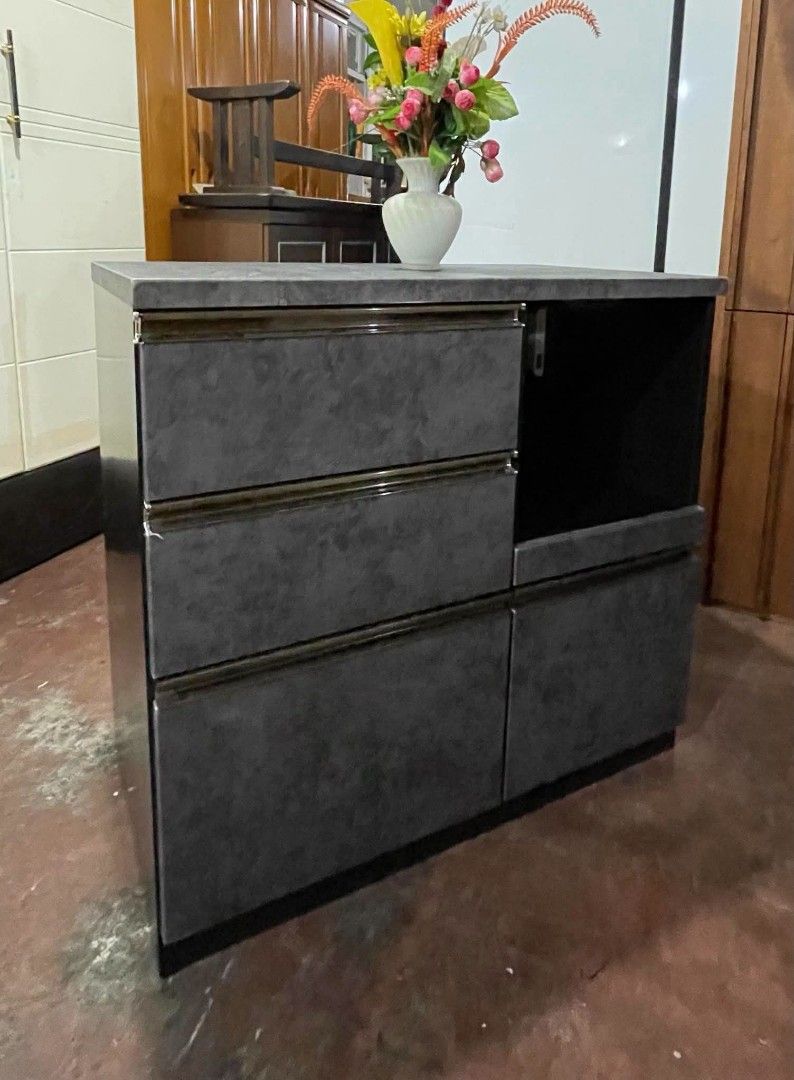 Kitchen Counter Buffet Sideboard Cabinet Coffee Nook (Category: Shelves, Cabinets & Racks) located in Quezon City. Submitted by dannikkishoppe2 (Listing ID 1464266881, Image 3). Description: Kitchen Counter Buffet Sideboard Cabinet Coffee Nook ‼️₱6800‼️ 💪 Sturdy & Durable 🔄 With Pull-Out Tray and built-in outlet for microwave, rice cooker, or other appliances Perfect for organizing your kitchen and keeping everything neat and accessible! 🏡✨ Pl