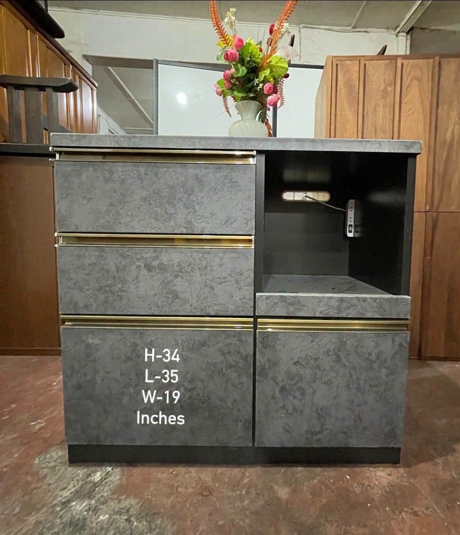 Kitchen Counter Buffet Sideboard Cabinet Coffee Nook (Category: Shelves, Cabinets & Racks) located in Quezon City. Submitted by dannikkishoppe2 (Listing ID 1464266881, Image 2). Description: Kitchen Counter Buffet Sideboard Cabinet Coffee Nook ‼️₱6800‼️ 💪 Sturdy & Durable 🔄 With Pull-Out Tray and built-in outlet for microwave, rice cooker, or other appliances Perfect for organizing your kitchen and keeping everything neat and accessible! 🏡✨ Pl