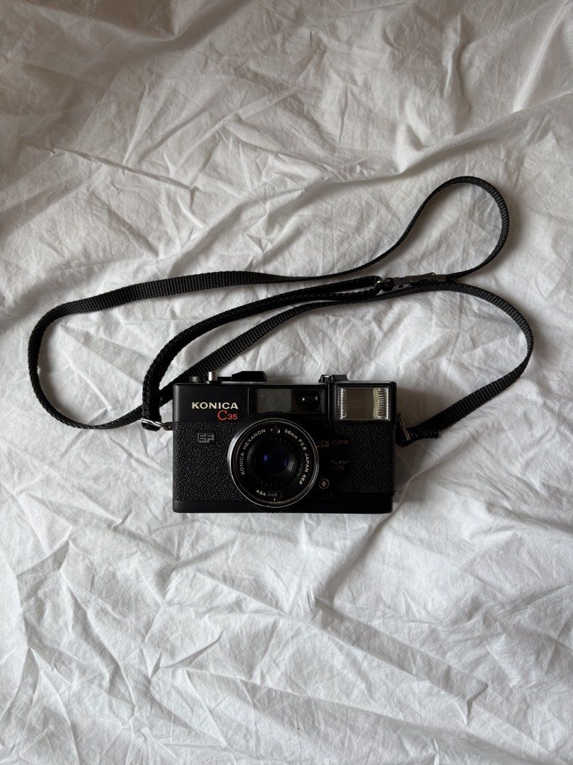 Konica C35 EF Film Camera (Category: Cameras) located in Pasig City. Submitted by parall3lles3m (Listing ID 1464281292, Image 2). Description: Konica C35 EF With sample pics! Flash working Please see images on film door Inclusions: Original pouch and lens cap MOP: BDO BPI Gcash Maribank Shipping from Pasig City.