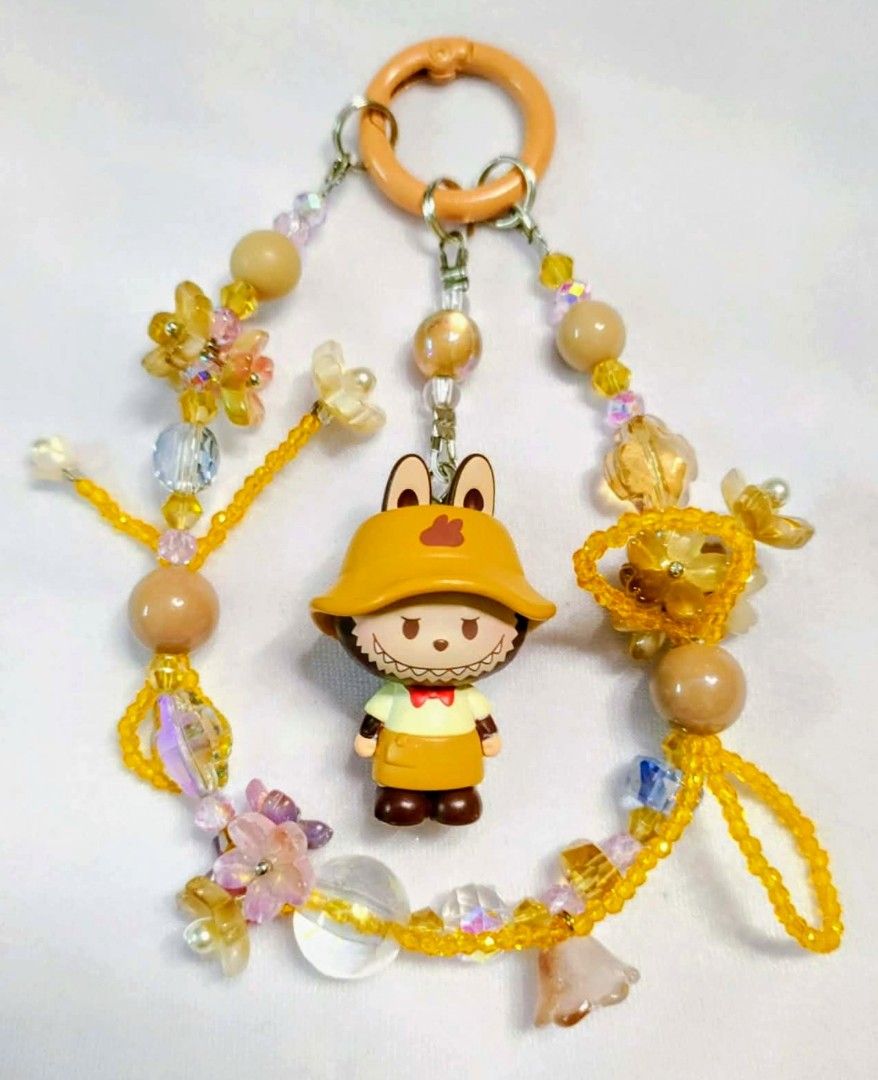 labubu yellow authentic popmart popbeans DIY charms (Category: Charms) located in Caloocan City. Submitted by jark_moonshop (Listing ID 1464279369, Image 1). Description: authentic popmart popbeans DIY charms with marking. gift pouch and transparent blank tag is available with extra fee of 10pesos per set of pouch and blank tag for tag price can do lalamove or JNT .