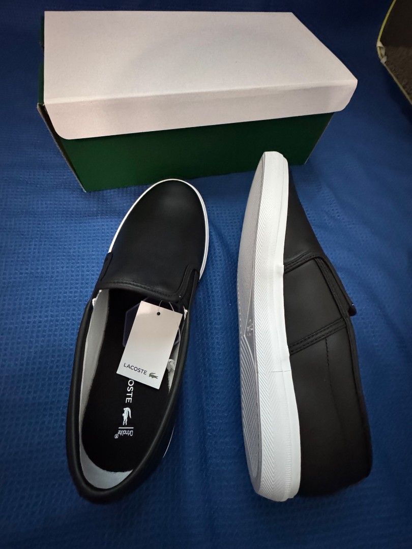 Lacoste Black Leather Slip-on (Category: Casual Shoes) located in Las Pinas. Submitted by specteretceps (Listing ID 1464263213, Image 2). Description: Brand New 3200 Delivery JT or Lalamove Payment: GCASH Loc: Las pinas, BGC .
