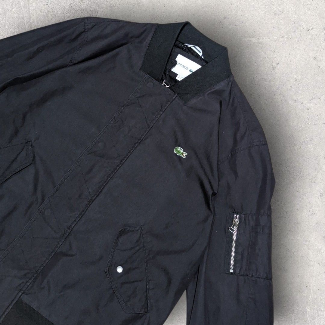 Lacoste Bomber Jacket (Category: Coats, Jackets and Outerwear) located in San Juan City. Submitted by 4keeps.mnl (Listing ID 1464298638, Image 2). Description: AUTHENTIC ✅ ORIGINAL Condition: 9.5/10 GANYAN PO TALAGA COLOR NYA Large 23x27 Issue: None.