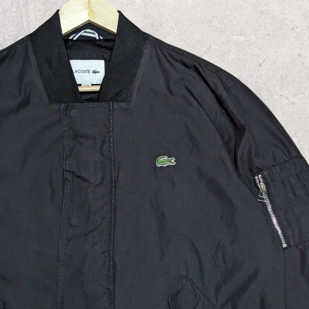 Lacoste Bomber Jacket (Category: Coats, Jackets and Outerwear) located in San Juan City. Submitted by 4keeps.mnl (Listing ID 1464298638, Image 3). Description: AUTHENTIC ✅ ORIGINAL Condition: 9.5/10 GANYAN PO TALAGA COLOR NYA Large 23x27 Issue: None.