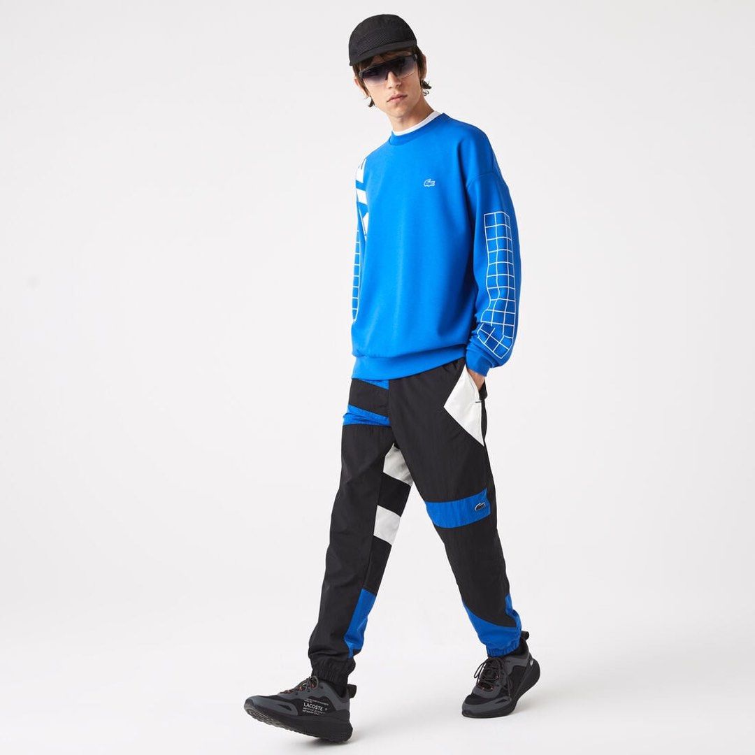 LACOSTE MENS PATCHWORK WATER PROOF NYLON CUFF PANTS (Category: Joggers) located in Las Pinas. Submitted by greedythrifterz (Listing ID 1464284752, Image 1). Description: LACOSTE MENS PATCHWORK WATER PROOF NYLON CUFF PANTS DIMES- WIDTH 30-36, LENGTH 41, THIGHS 14 (ALL INCHES) NEEDWASH ONLY, FREE SHIP AND NEGOTIABLE .