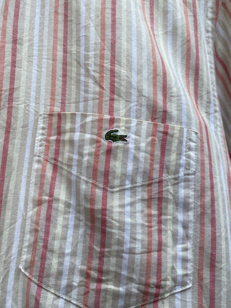 Lacoste Multicoloured Polo Shirt (Category: Activewear) located in Balamban. Submitted by anikdotal (Listing ID 1464172155, Image 2). Description: Lacoste Multicoloured Polo Shirt Size(Large) Length(28-30) Width(22) Like New Condition No Issue❌ Price+Shipping Fee📨 LOC:BALAMBAN CEBU COURIER: J&T & FLASH EXPRESS MOP: Gcash. Payment first policy. No COD Unli Vouch. Valid id. Video Call.