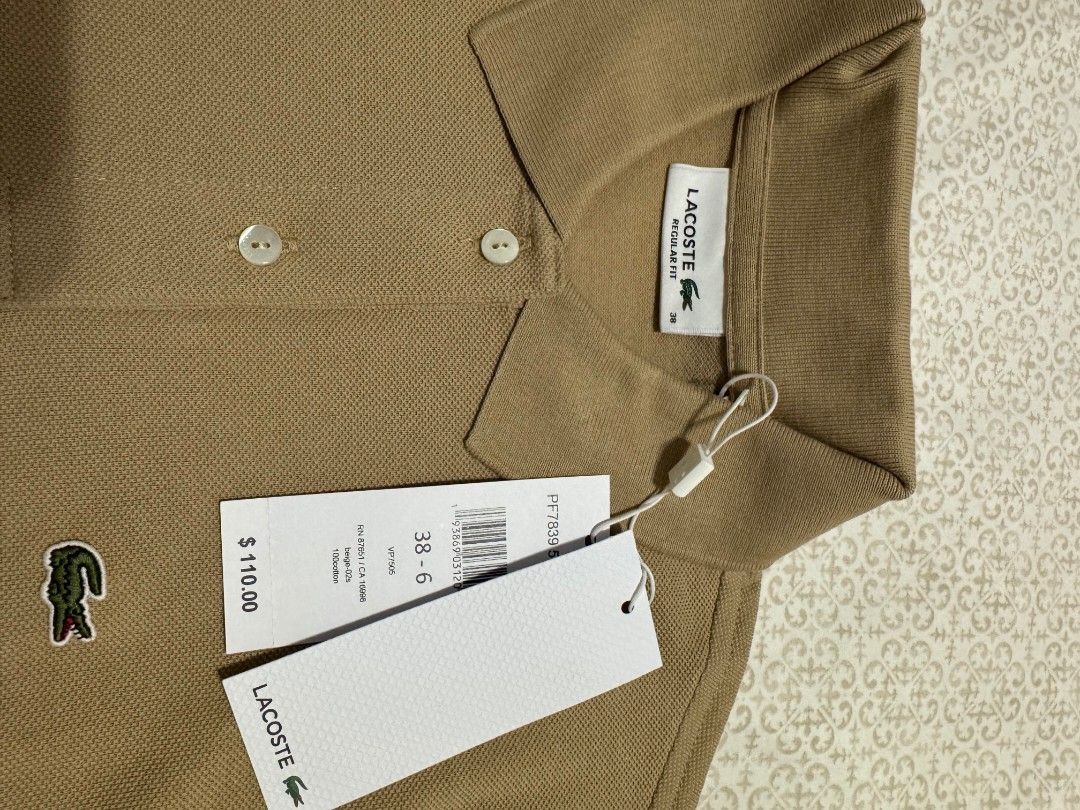 Lacoste Polo Shirt - Beige - Regular Fit (Category: Shirts) located in Las Pinas. Submitted by specteretceps (Listing ID 1464263164, Image 2). Description: All Brand New Size 36 & 38 4500 Delivery JT or Lalamove Payment: GCASH Loc: Las pinas, BGC .