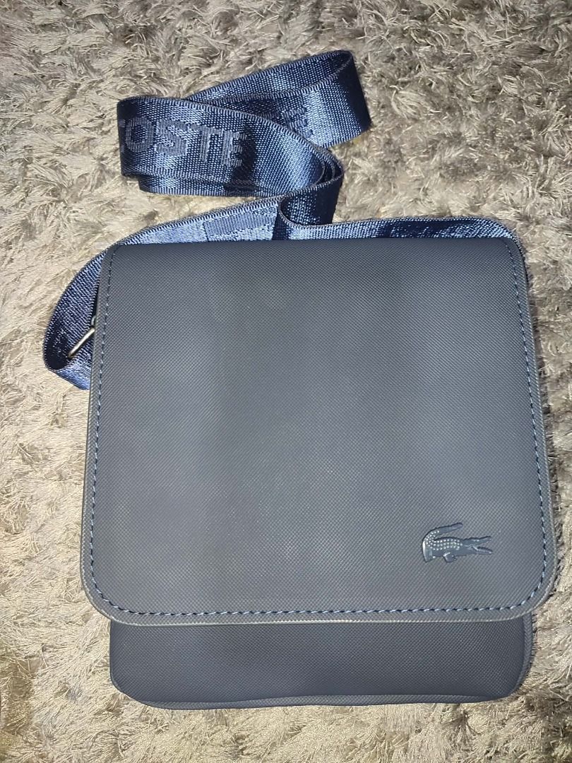 Lacoste Sling Bag (Category: Sling Bags) located in Quezon City. Submitted by evea_08fashion (Listing ID 1464194061, Image 2). Description: .