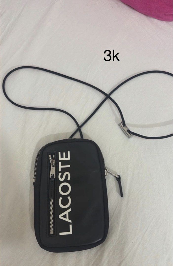 Lacoste sling bag or body bag (Category: Cross-body Bags) located in Quezon City. Submitted by ivygolaysiz (Listing ID 1464286417, Image 1). Description: Unisex.