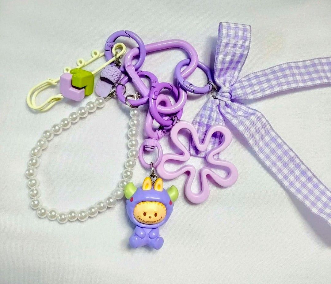 lavender labubu authentic popmart popbeans DIY charms (Category: Charms) located in Caloocan City. Submitted by jark_moonshop (Listing ID 1464268291, Image 1). Description: authentic popmart popbeans DIY charms with marking. gift pouch and transparent blank tag is available with extra fee of 10pesos per set of pouch and blank tag for tag price can do lalamove or JNT .