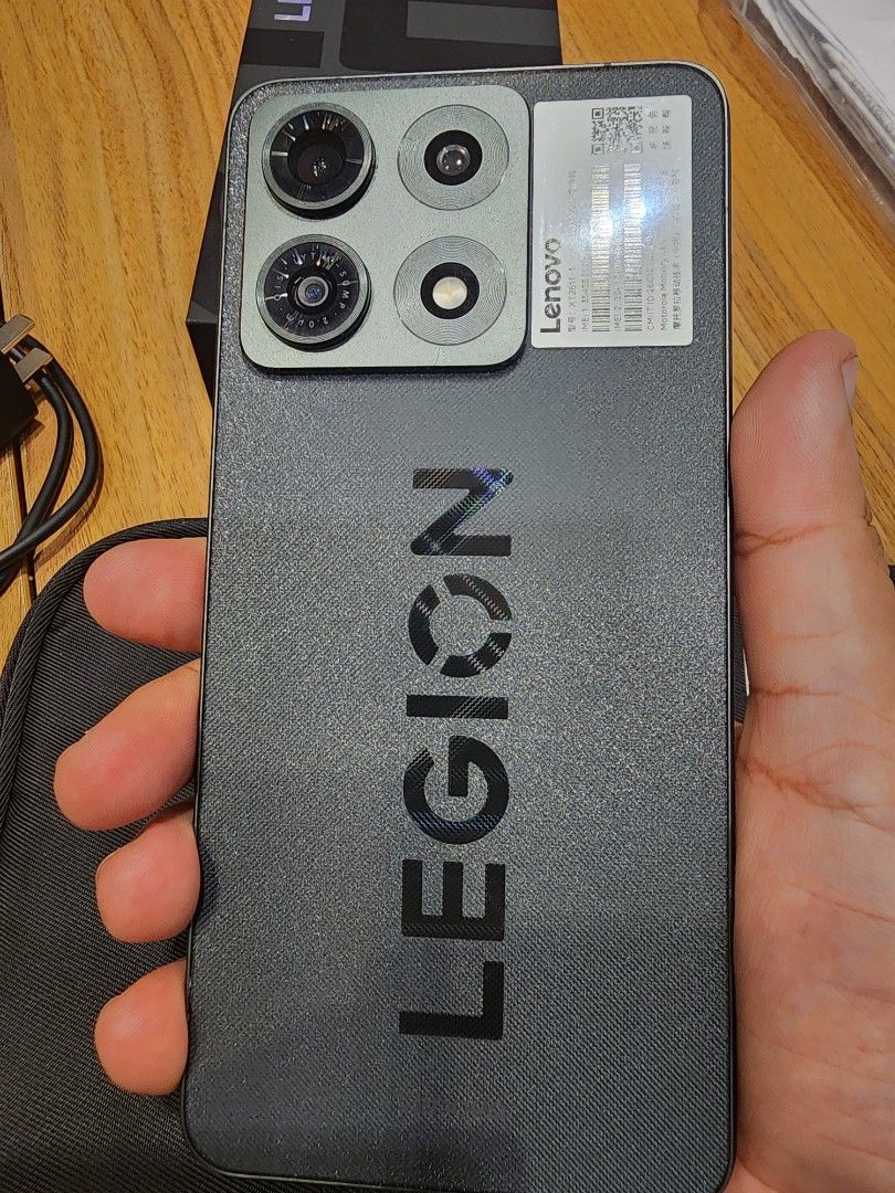 Lenovo Legion Y70 (Category: Android Others) located in Manila. Submitted by swifthawk.2c27a5 (Listing ID 1464338774, Image 1). Description: - Lenovo Legion Gaming Phone -16gb RAM/512gb ROM -With installed Hydrogel matte from Xundd - Sleek and stylish design - Capable rear camera setup -Snapdragon 8 Gen 5 - Battery health at a perfect 100% - Includes original box and charger - Ready for its next owner! .