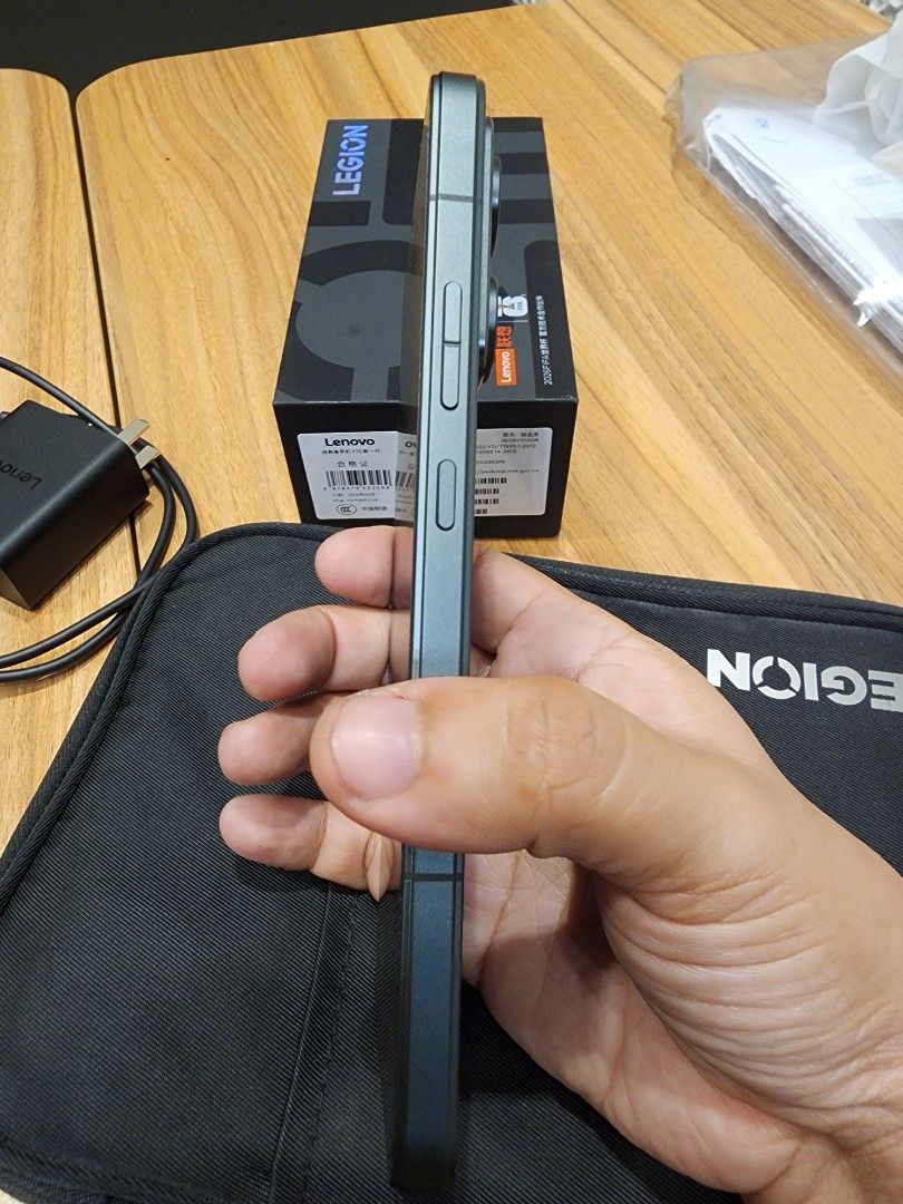 Lenovo Legion Y70 (Category: Android Others) located in Manila. Submitted by swifthawk.2c27a5 (Listing ID 1464338774, Image 2). Description: - Lenovo Legion Gaming Phone -16gb RAM/512gb ROM -With installed Hydrogel matte from Xundd - Sleek and stylish design - Capable rear camera setup -Snapdragon 8 Gen 5 - Battery health at a perfect 100% - Includes original box and charger - Ready for its next owner! .