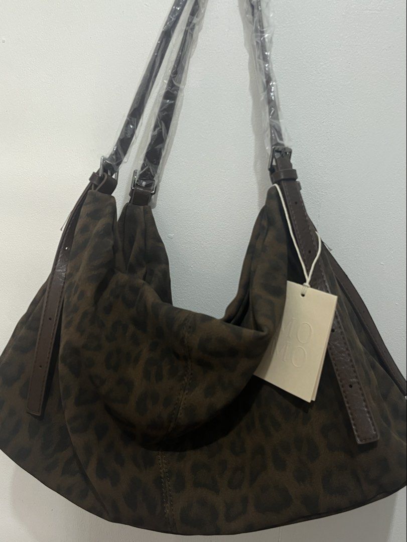 leopard print hobo bag (Category: Shoulder Bags) located in Caloocan City. Submitted by sarangh0ee (Listing ID 1464212989, Image 2). Description: - from bangkok - bnew with tag - super spacious! perfect as work bag - zipper opening is small but the inside is v big. can fit a lot of things :) .