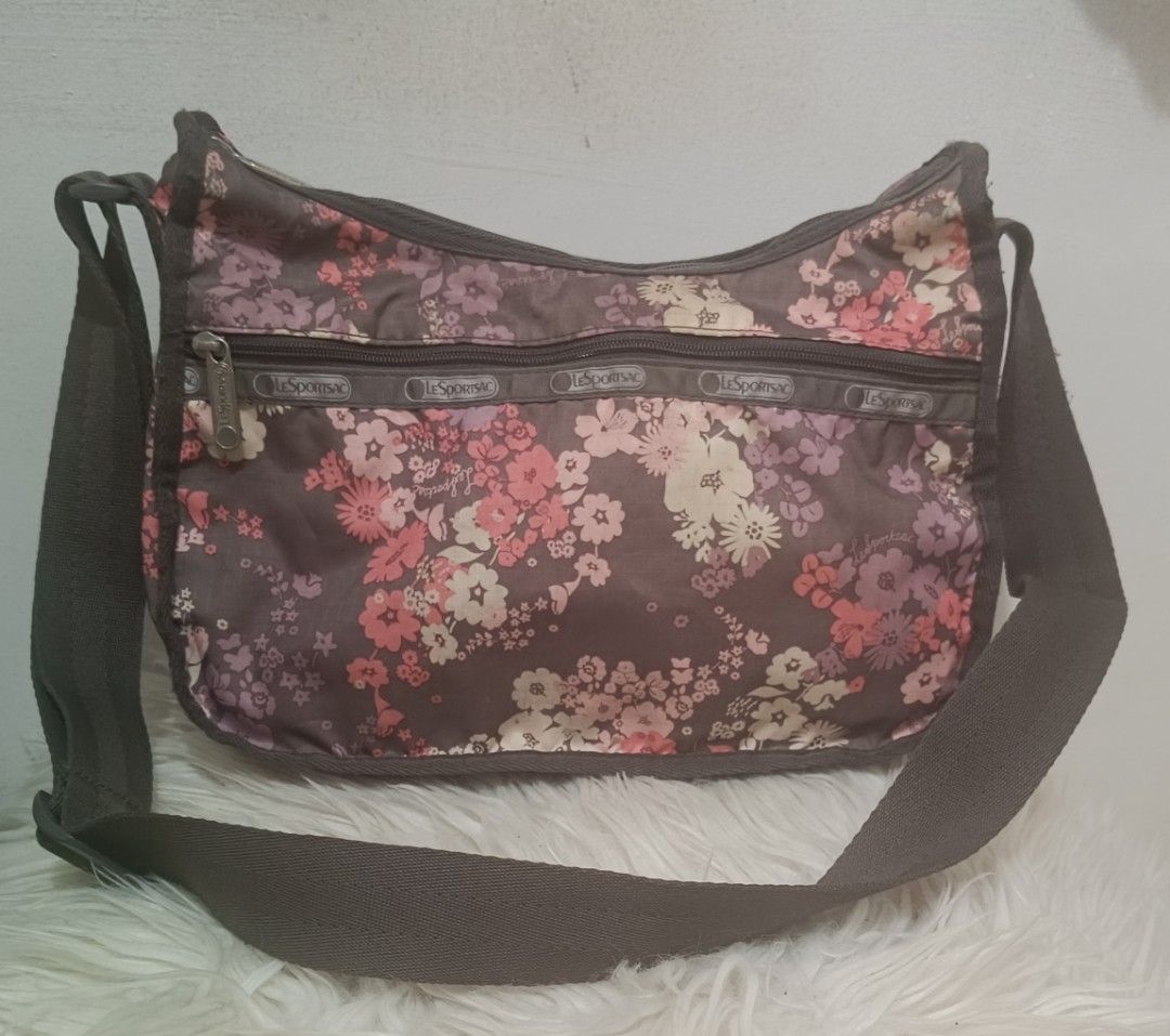 Lesportsac Crossbody (Category: Cross-body Bags) located in Davao. Submitted by naxarugal (Listing ID 1464160656, Image 1). Description: ukay source issue: may pen marks sa loob length 11.5 inches width 5.5 inches height 7.5 inches.