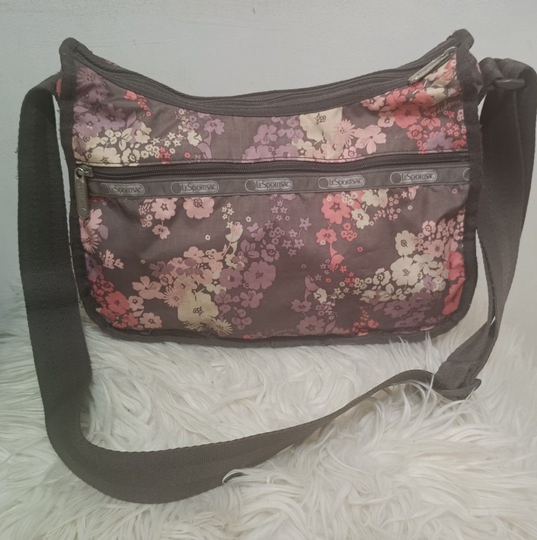 Lesportsac Crossbody (Category: Cross-body Bags) located in Davao. Submitted by naxarugal (Listing ID 1464160656, Image 3). Description: ukay source issue: may pen marks sa loob length 11.5 inches width 5.5 inches height 7.5 inches.