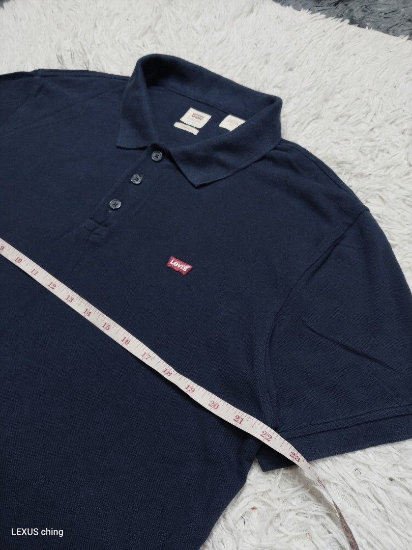 Levi's a small red batwing logo on chest. (Category: Tshirts & Polo Shirts ) located in Manila. Submitted by lexusthrift1995 (Listing ID 1464223441, Image 2). Description: Size- LARGE on tag but fit to XL Dimension- 22x28 Color rate- 8/10 Condition-9/10 issue- no issue good condition ‼️350.pesos plus shipping fee 💸MODE OF PAYMENT- GCASH payment first 🚛MODE OF DELIVERY- J&T or LALAMOVE 📍LOCATION- NORTH CALOOCAN CAMARIN BRGY.177 1705 SUNFLOWER S
