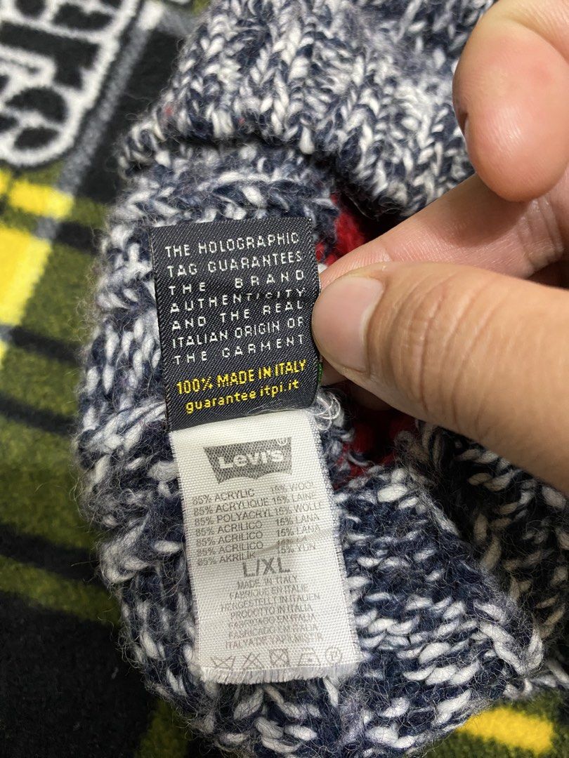 LEVI'S, beanie hat (Category: Beanies) located in Cavite. Submitted by jc_thrift95 (Listing ID 1464219719, Image 3). Description: - This colorful knit beanie features a tri-color block design in dark blue, vibrant red, and a speckled black-and-white brim accented with a small brown leather-like patch. - Made in Italy - Color rate 8/10 - See pictures details for dimes..